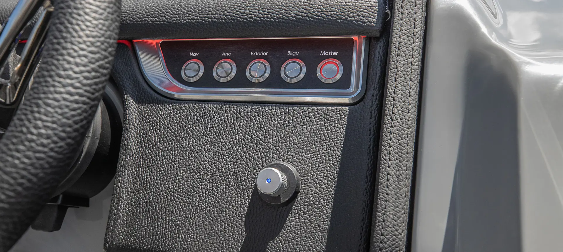 ignition button on a godfrey aquapatio lounge pontoon