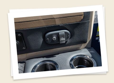 helm controls on a godfrey aquapatio split bench pontoon