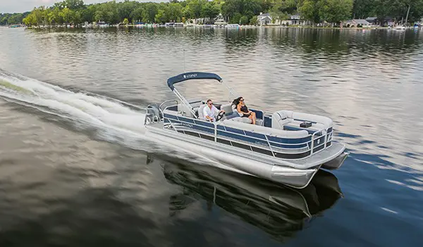 godfrey sweetwater entertainment pontoon speeding across a lake