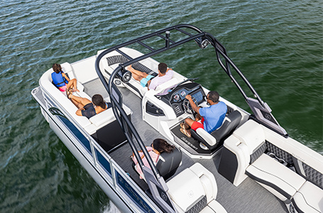 people enjoying the premium seating on a godfrey split bench pontoon