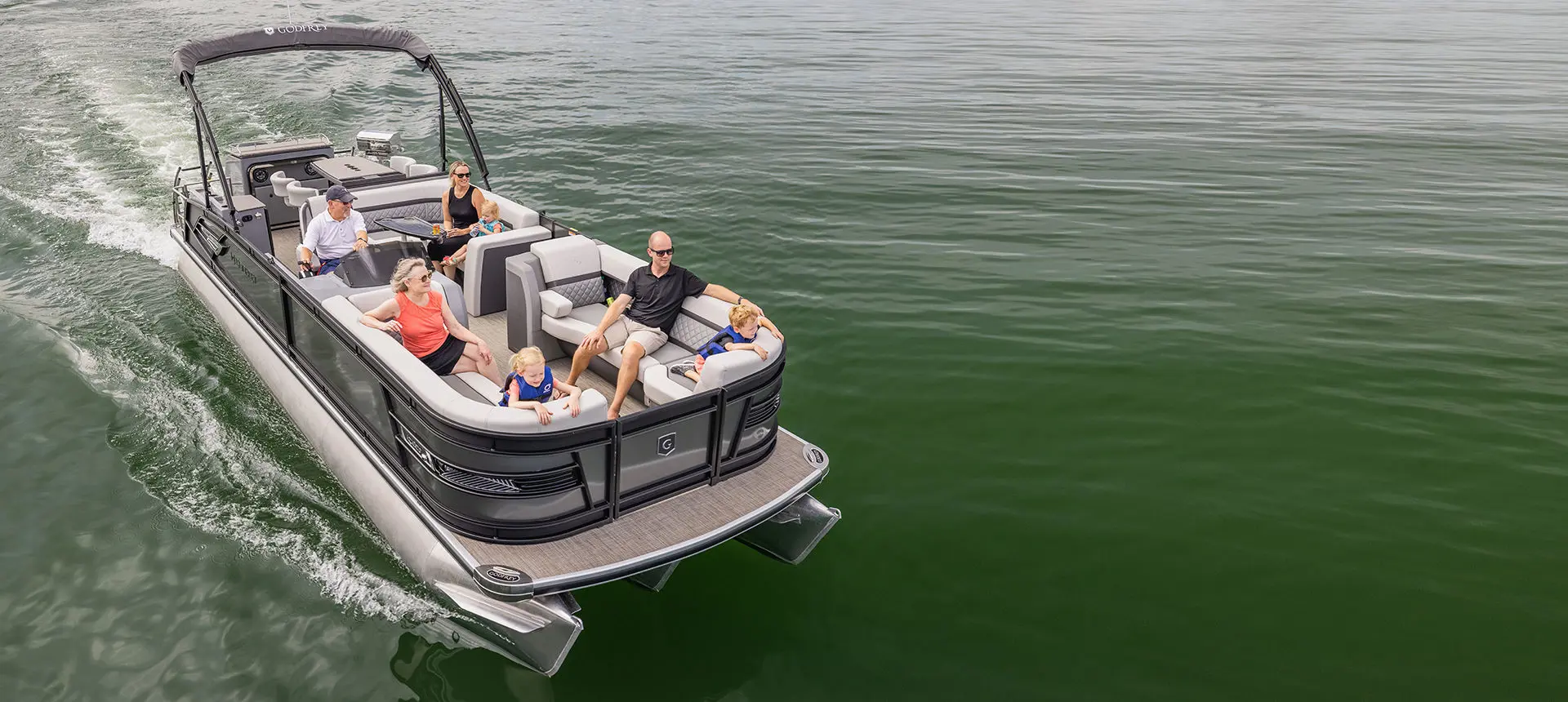 The bow and bow gate on a Godfrey AquaPatio Entertainment pontoon boat.