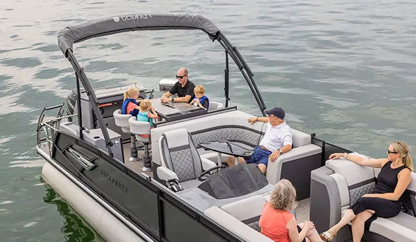 family enjoying the lake on a godfrey aquapatio entertainment pontoon
