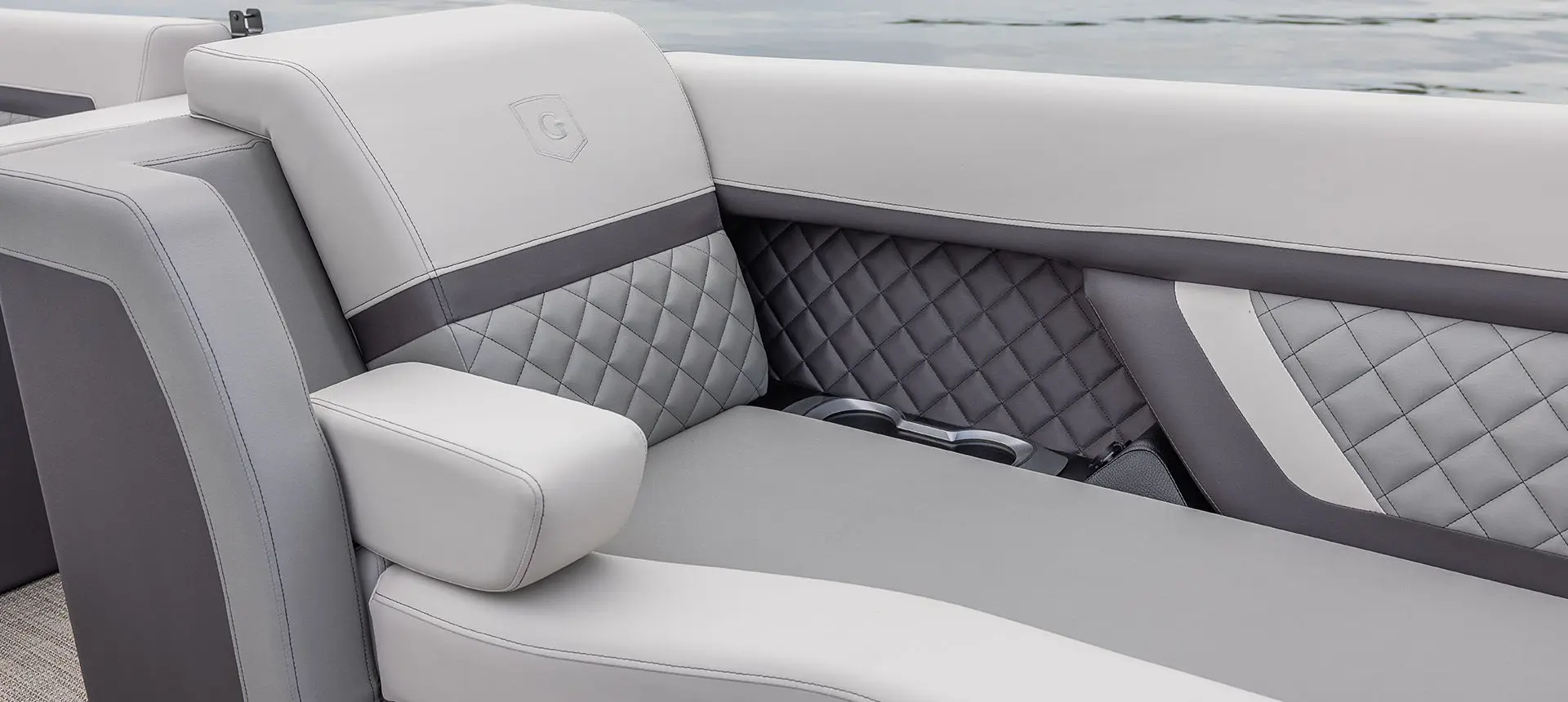 details on the split bench seating on a godfrey aquapatio entertainment pontoon