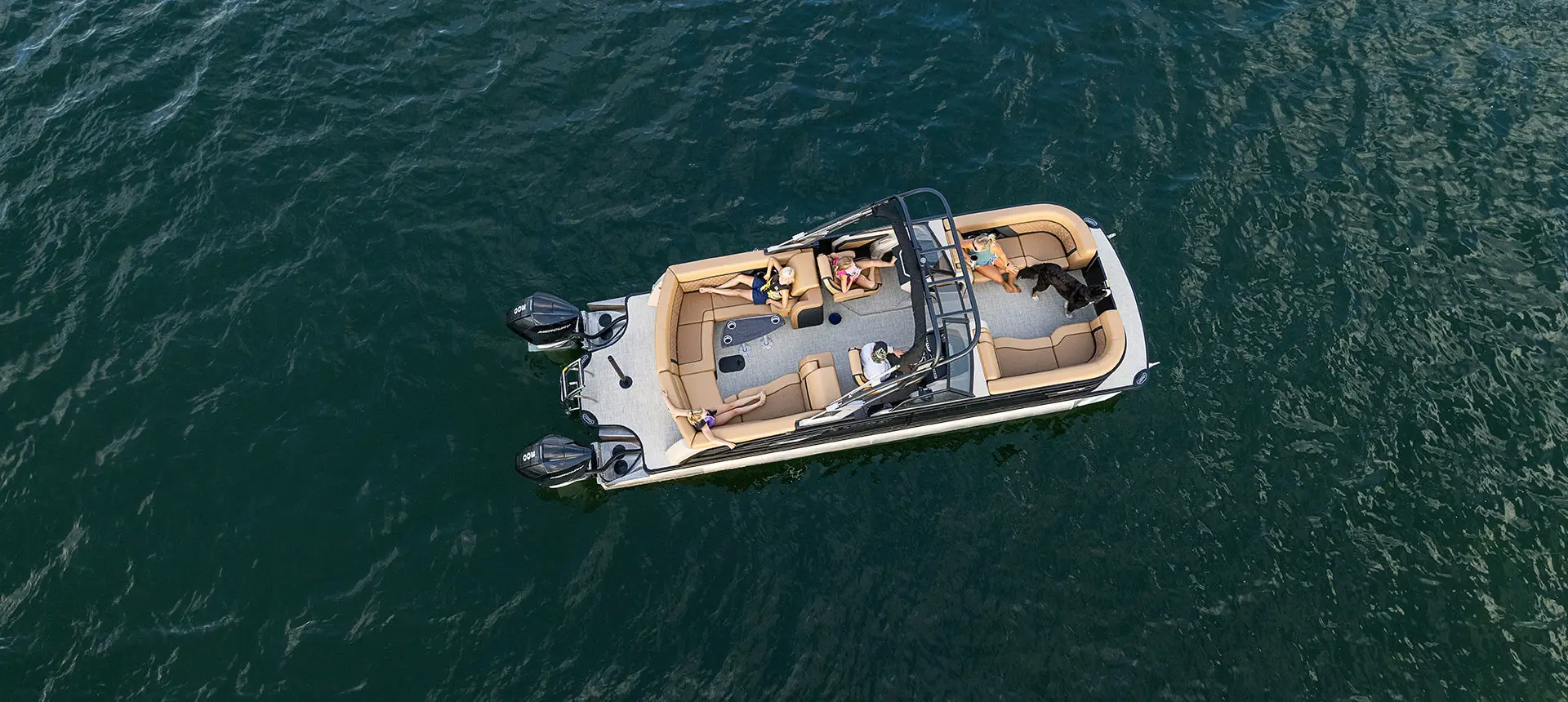top view of a godfrey aquapatio lounge pontoon on a lake