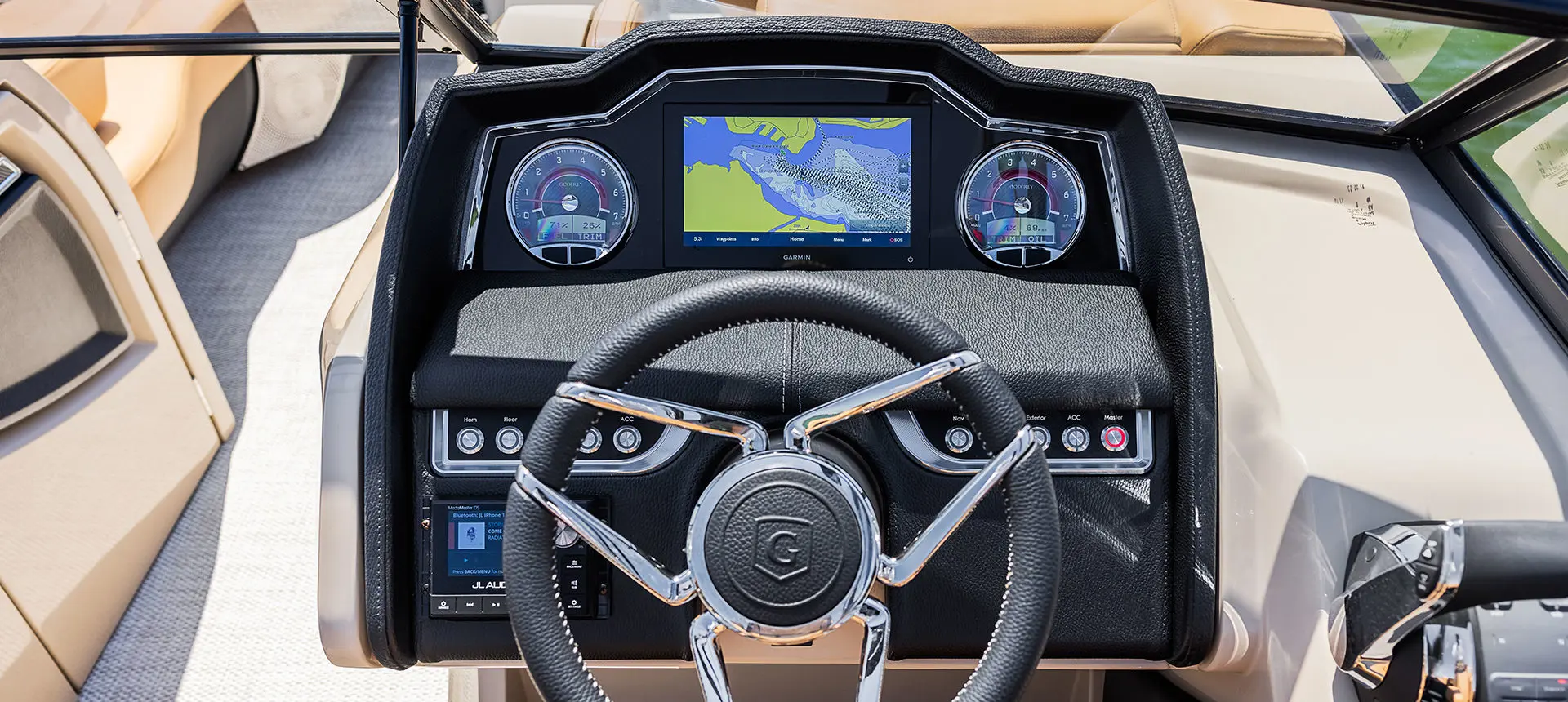 dashboard and steering wheel on a godfrey aquapatio lounge pontoon