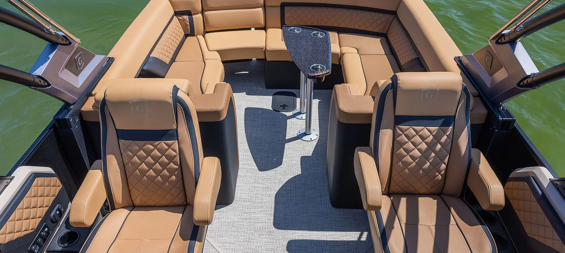 overhead view of the co-captain's chairs and stern ultra lounge seat on a godfrey aquapatio winshield pontoon