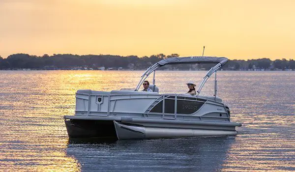 godfrey monaco cruise pontoon floating at sunset