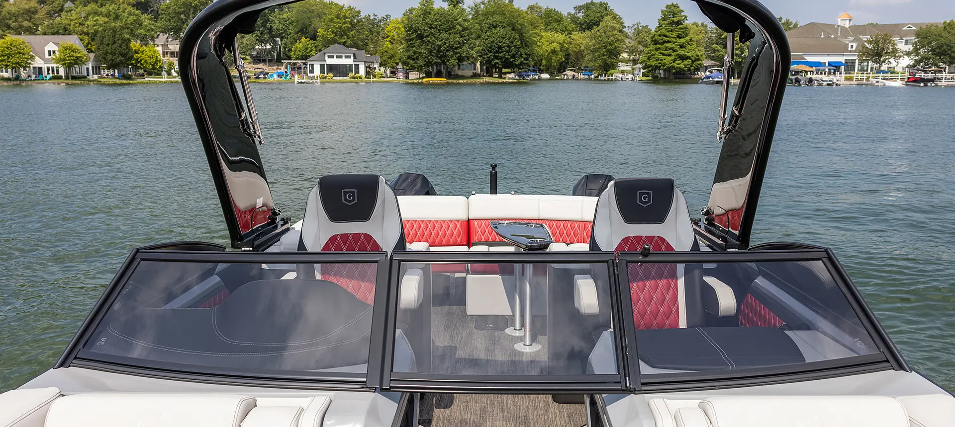 front view of a godfrey sanpan lounge pontoon