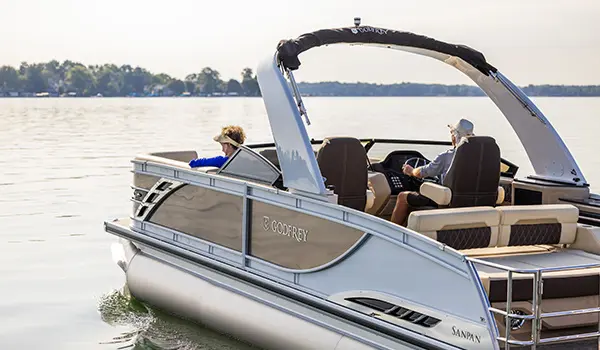 side view of a godfrey sanpan lounge pontoon