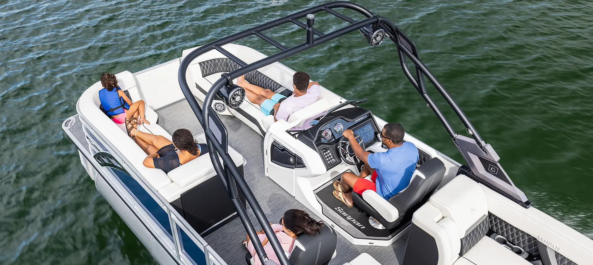 aerial view of a family relaxing on their godfrey sanpan split bench pontoon