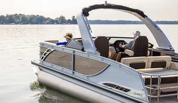side view of a godfrey sanpan windshield pontoon