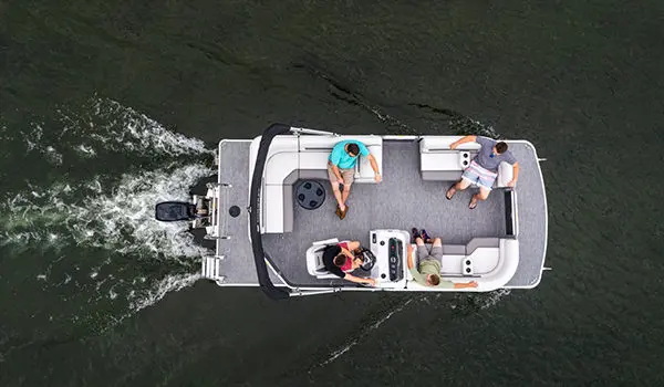 aerial view of a godfrey xperience cruise pontoon on a lake