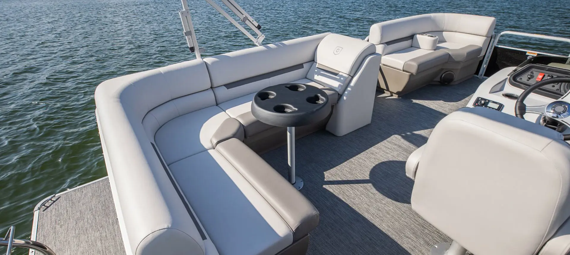 stern couch and table on a godfrey xperience cruise pontoon