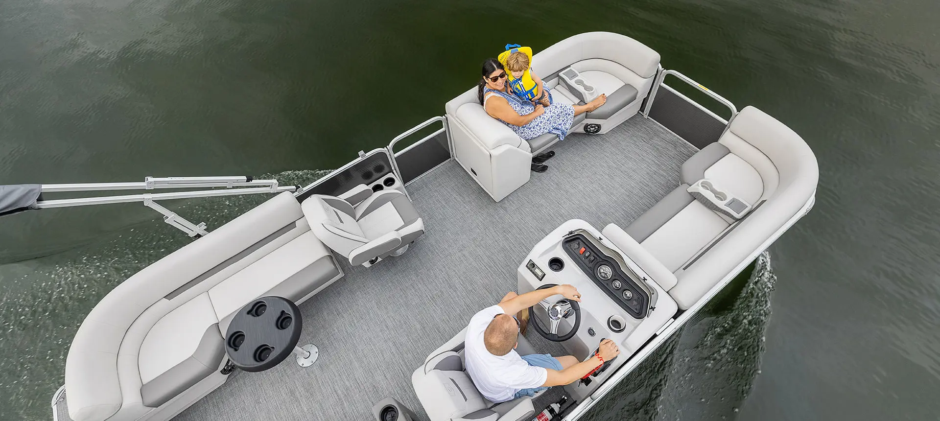 aerial view of a family on a godfrey xperience split bench pontoon