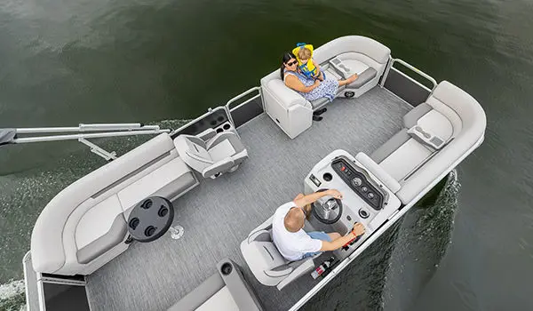 aerial view of a family on a godfrey xperience split bench pontoon