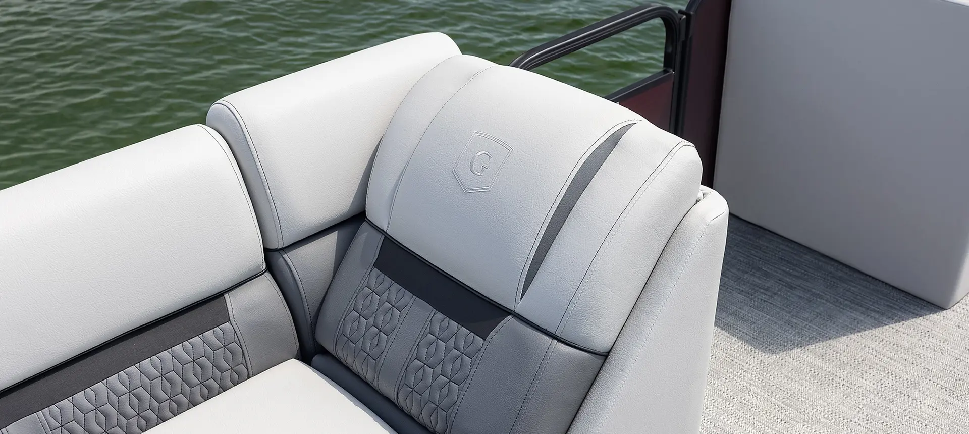 premium stitching on the split bench seats on a godfrey sweetwater cruise tritoon