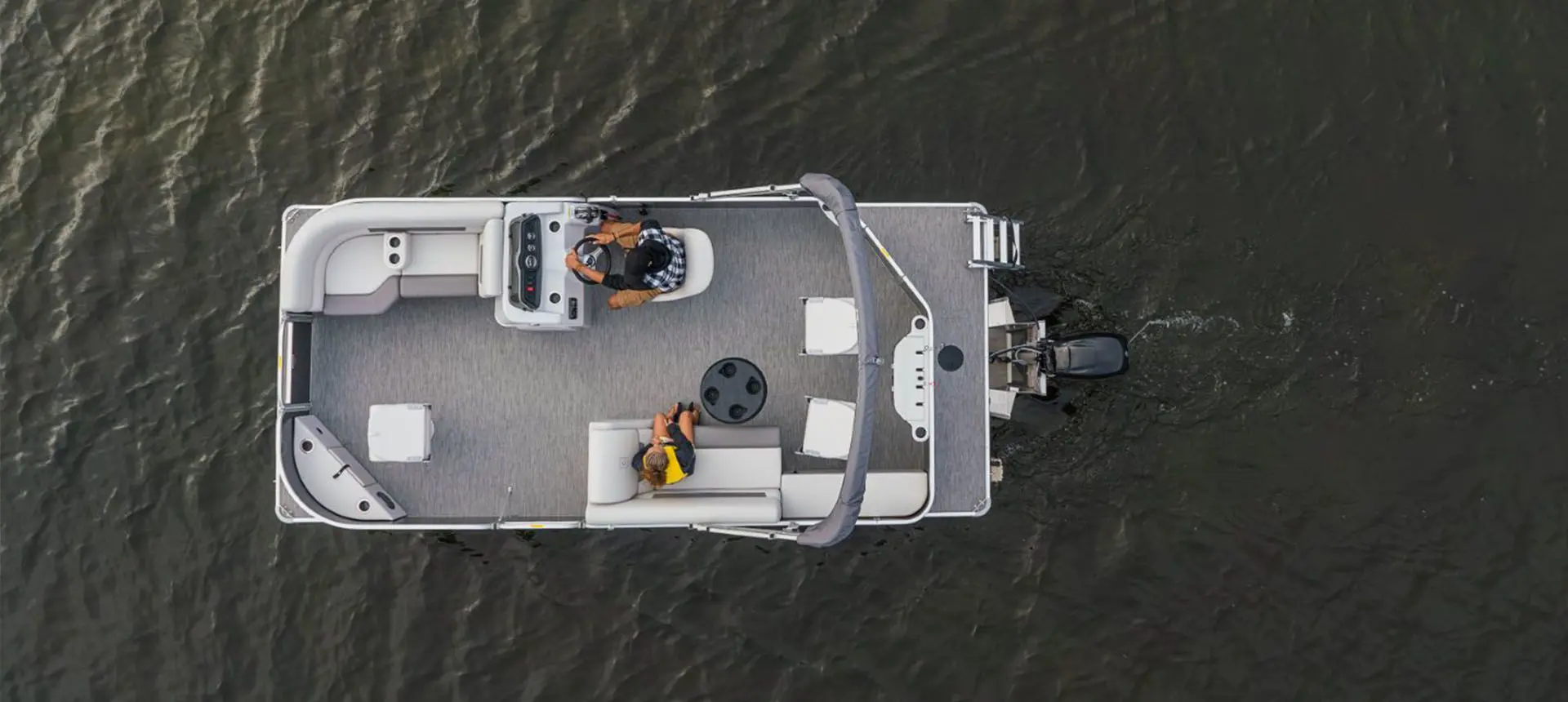 aerial view of a godfrey xperience pontoon floating on a lake