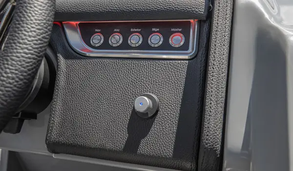 switches at the helm on a godfrey aquapatio lounge pontoon