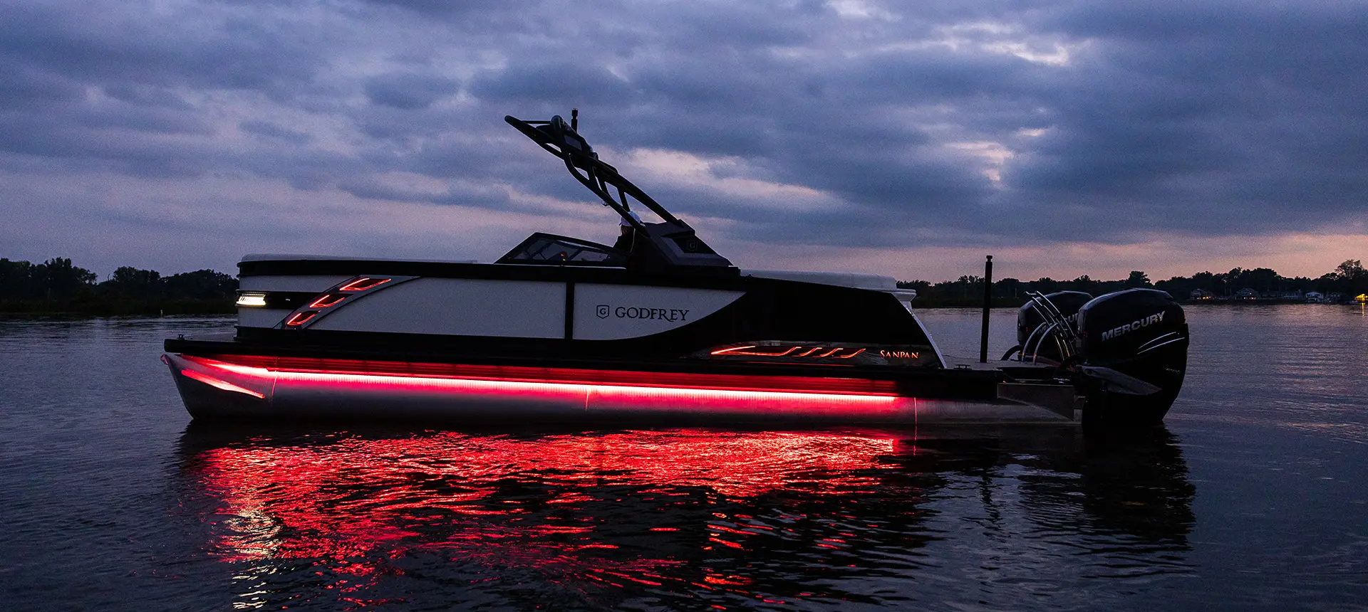 Full spectrum RGB color lighting package on a Godfrey Sanpan Twin tritoon.