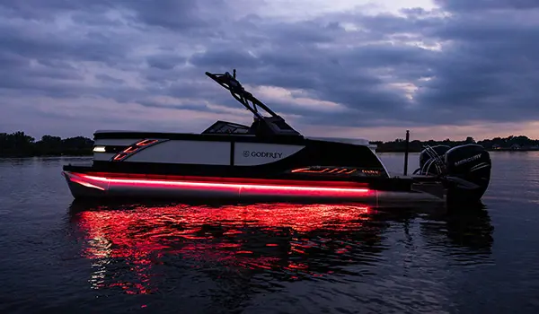 Full spectrum RGB color lighting package on a Godfrey Sanpan Twin tritoon.