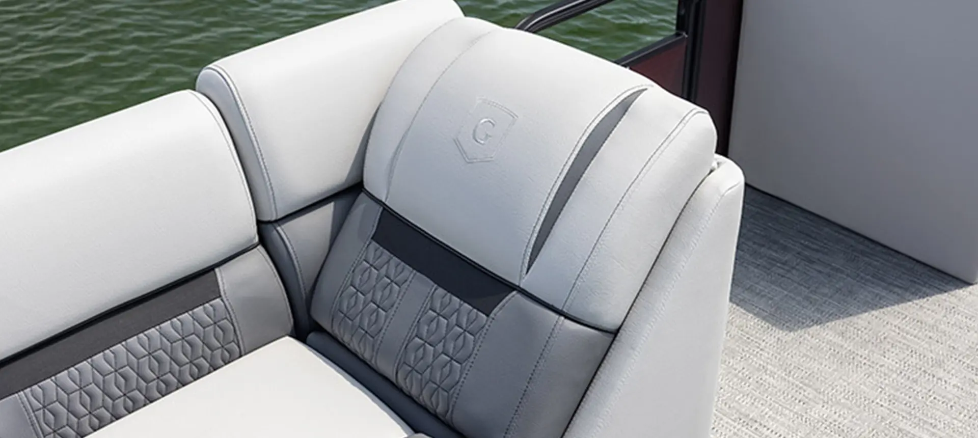 premium stitching on the split bench seating on a godfrey sweetwater entertainment pontoon