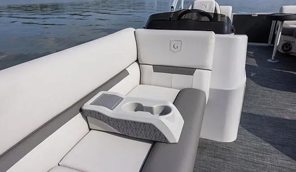 moveable cup holder on a split bench seat on a godfrey xperience split bench pontoon