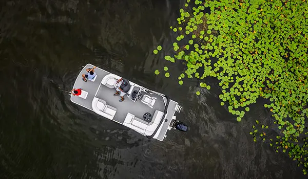 aerial view of a family fishing with their godfrey xperience fishing pontoon