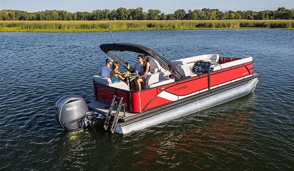 aerial view of 2 couples having fun of a godfrey sweetwater entertainment pontoon