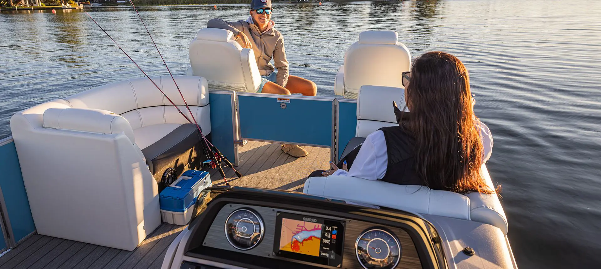2 people ready to fish on a godfrey sweetwater fishing pontoon