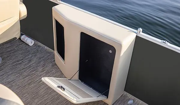 Integrated storage options on a Godfrey Sweetwater Cruise pontoon boat.
