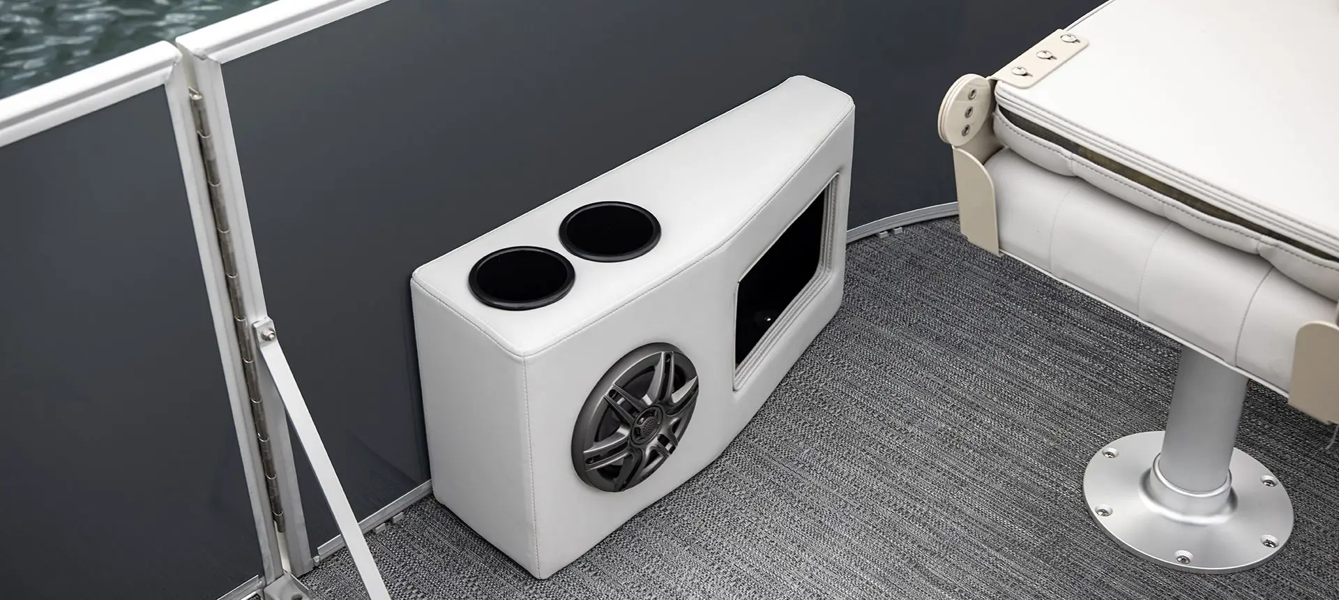 Integrated speakers and cupholders on a Godfrey Sweetwater Fishing pontoon boat.