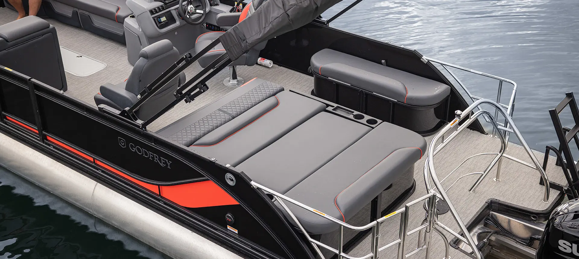 Stern lounge seating on a Godfrey Sweetwater Lounge pontoon boat.