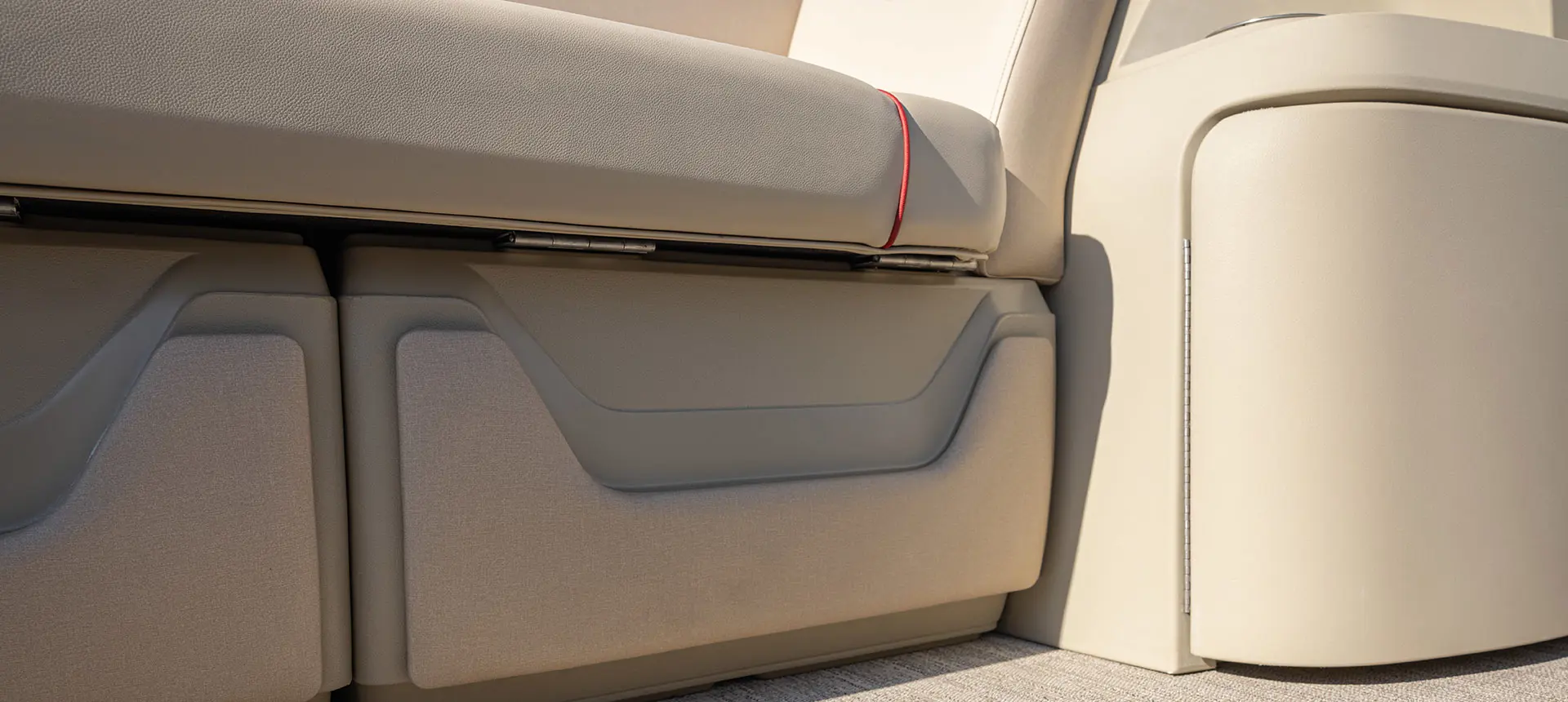 Details of the split bench seats on a Godfrey Sweetwater Split Bench pontoon boat.