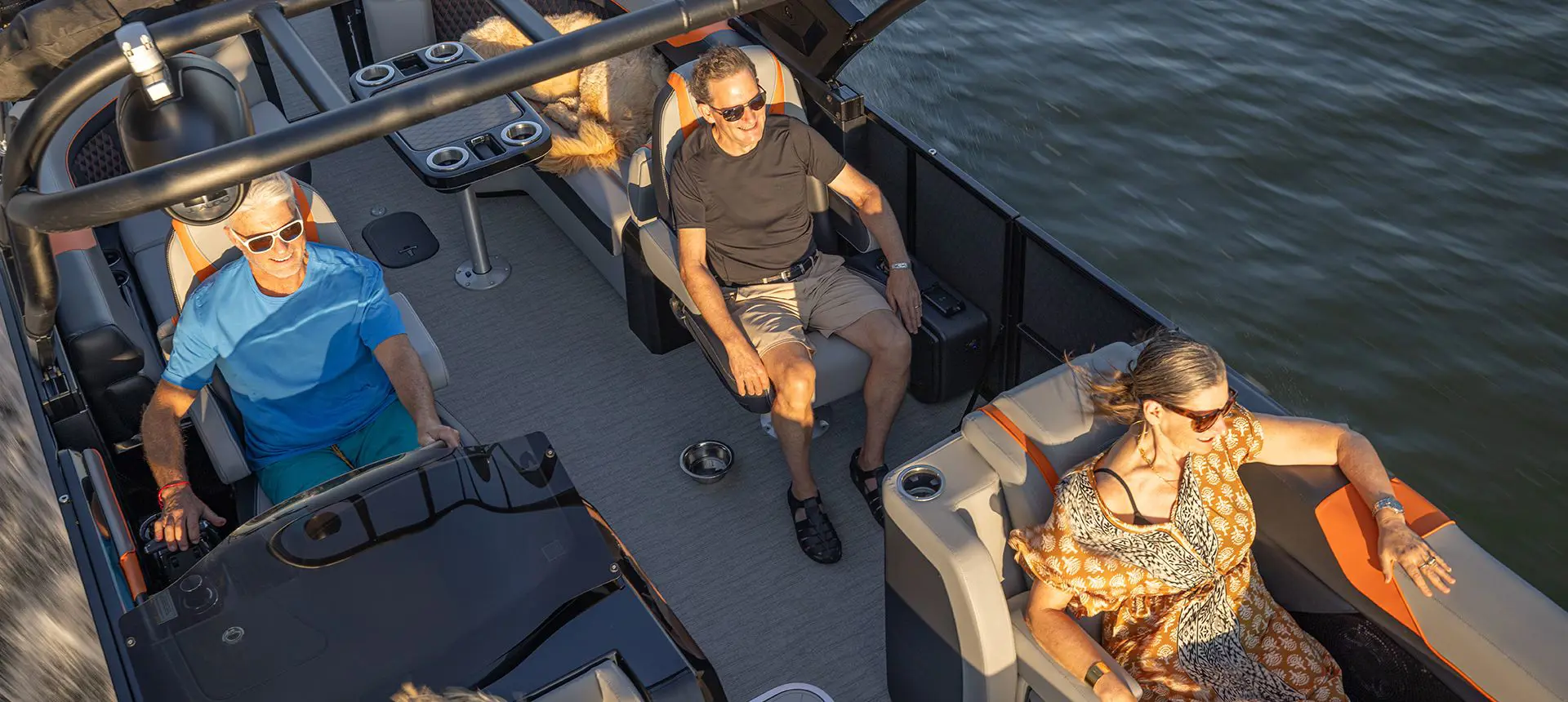 Aerial view of a 4 people enjoying the comfort and durability of a Godfrey XP Tritoon boat.