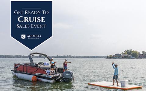 Friends having fun on a parked Hurricane Pontoon and floatation pad. Get Ready To Cruise Sales Event.