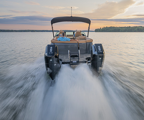 Rear-end view of a 1,000 horsepower twin engine on a Godfrey pontoon boat. 