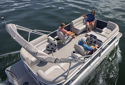 3 friends enjoying the lake on a Godfrey Xperience pontoon boat.