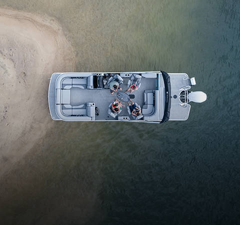  Aerial view of a Godfrey pontoon boat with a Quad Social Bench (QSB) layout.