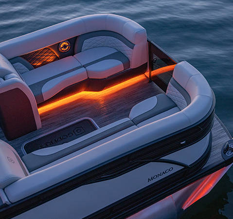 RGB lighting on a Godfrey pontoon boat with a Quad Social Bench (QSB) layout.