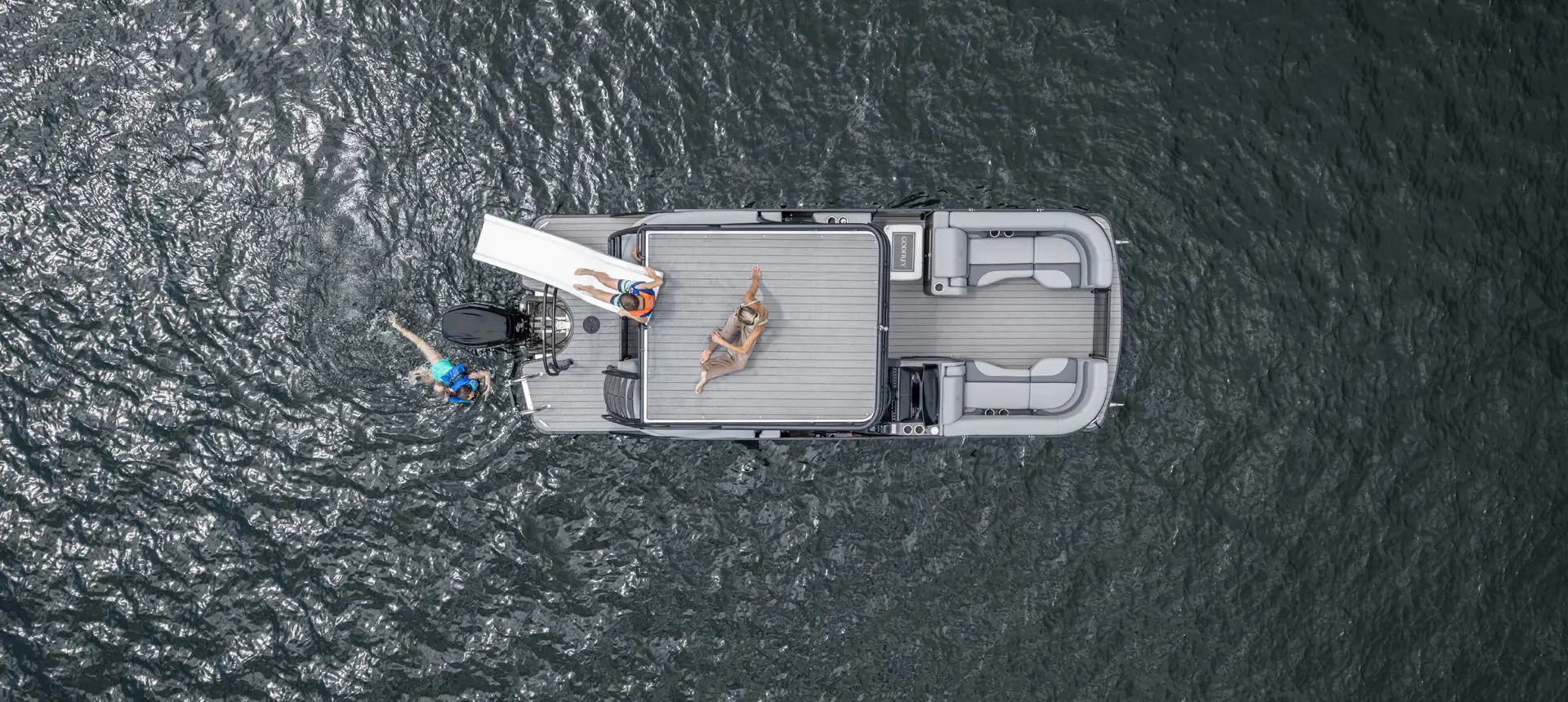 Aerial view of a Godfrey Monaco pontoon boat with a Sundeck.