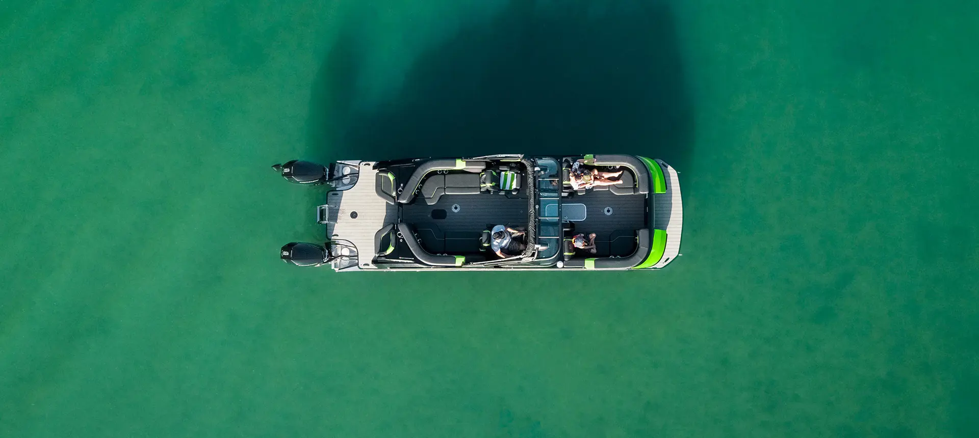 Aerial view showcasing the layout of a Godfrey XP tritoon boat.