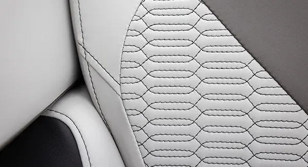 Premium stitching pattern on the seat of a Godfrey AquaPatio pontoon boat.