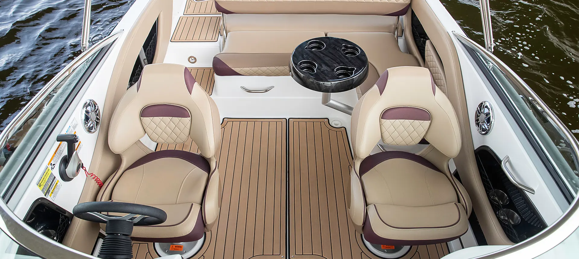 hurricane sundeck 2410 OB deck boat with soft touch tan interior with black cherry accent