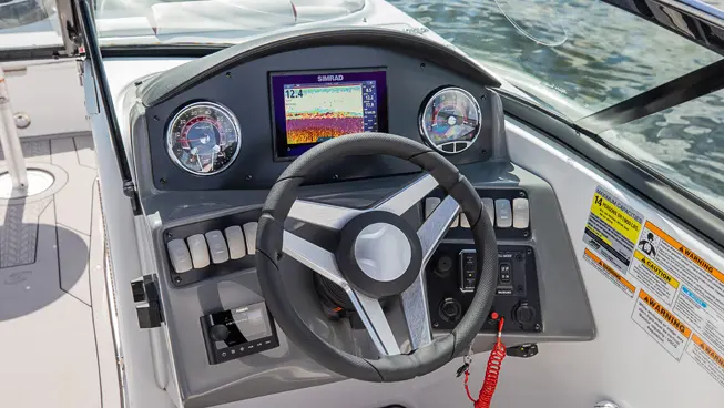 steering wheel on the hurricane sundeck OB deck boat