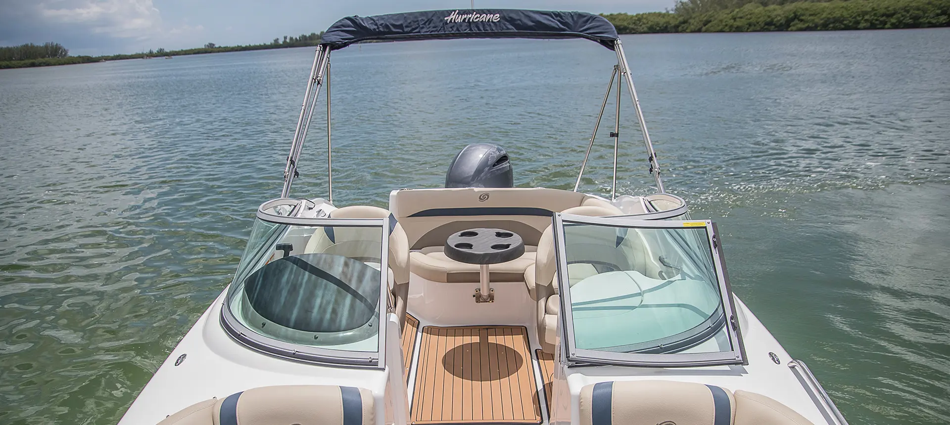 stern focused view of a hurricane sundeck 2200 DC OB deck boat