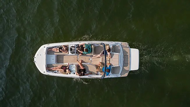 top view of a hurricane sundeck sport i/o deck boat floating