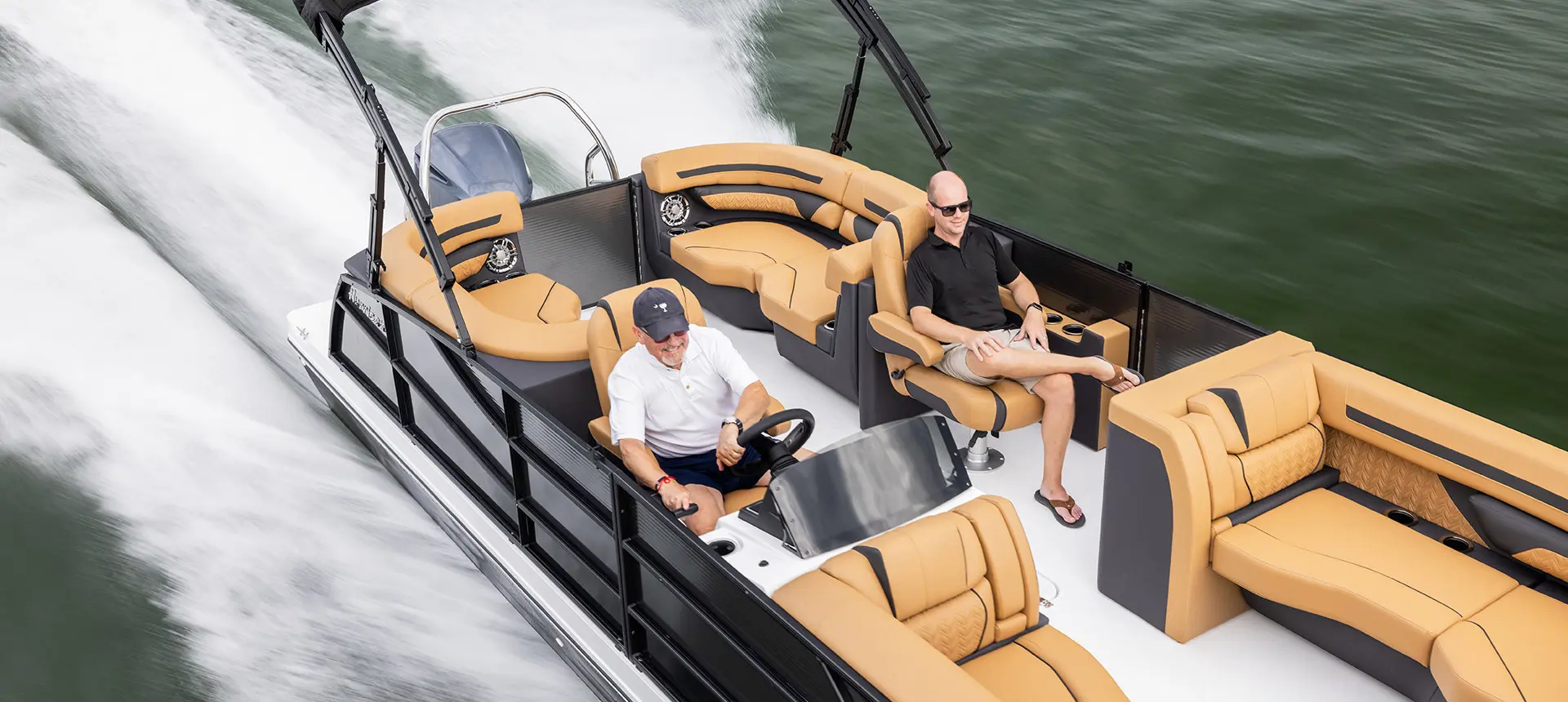 aerial view of 2 men on a hurricane fundeck boat