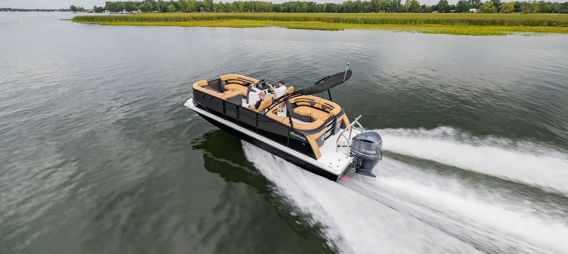 side profile of the bimini and engine on a hurricane fundeck boat