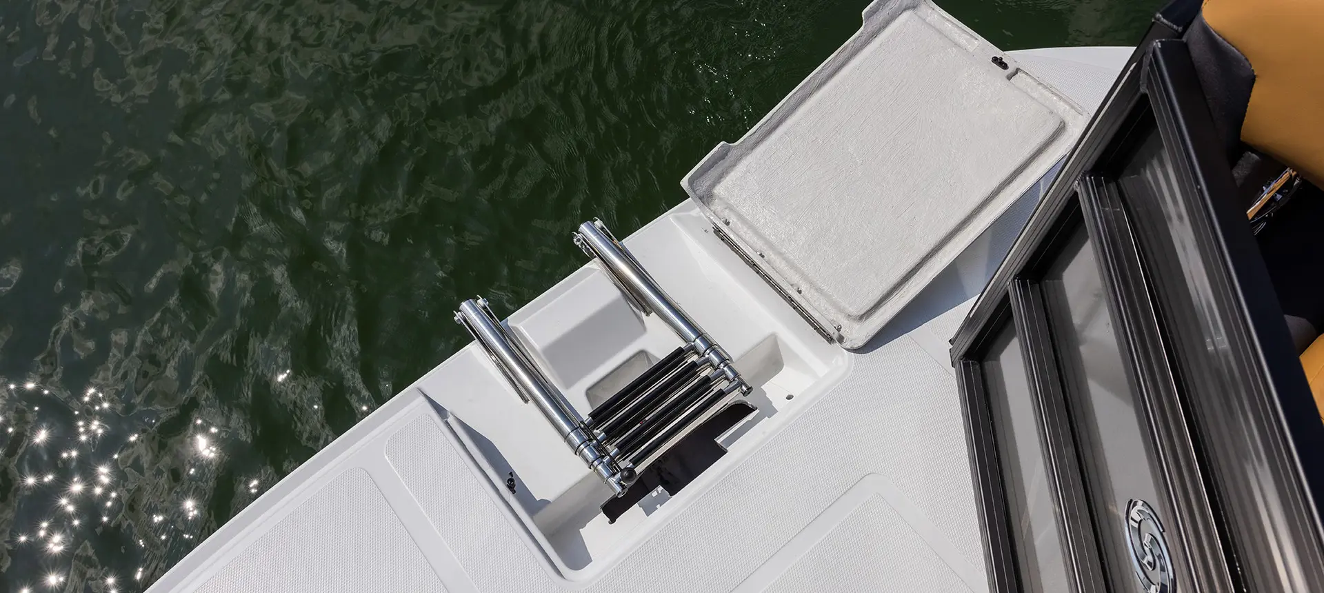 folding ladder on the stern of a hurricane fundeck boat