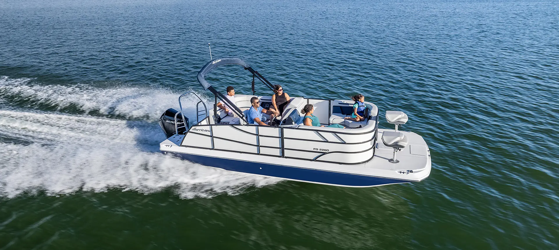 family speeds on lake on hurricane fundeck 2260 ref ob